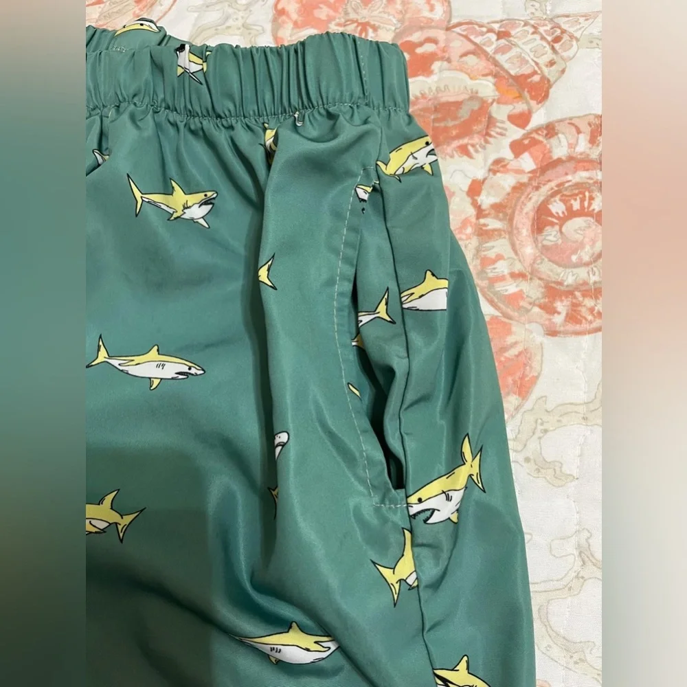(8) Green and yellow shark shorts with pockets